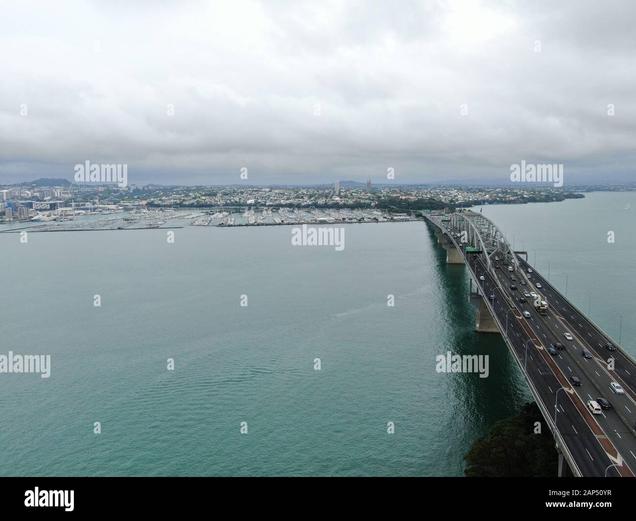 Viaduct Harbour, Auckland / New Zealand - December 30, 2019: The Amazing Auckland Harbour Bridge, the marina bay, beaches, and the general cityscape o Stock Photo