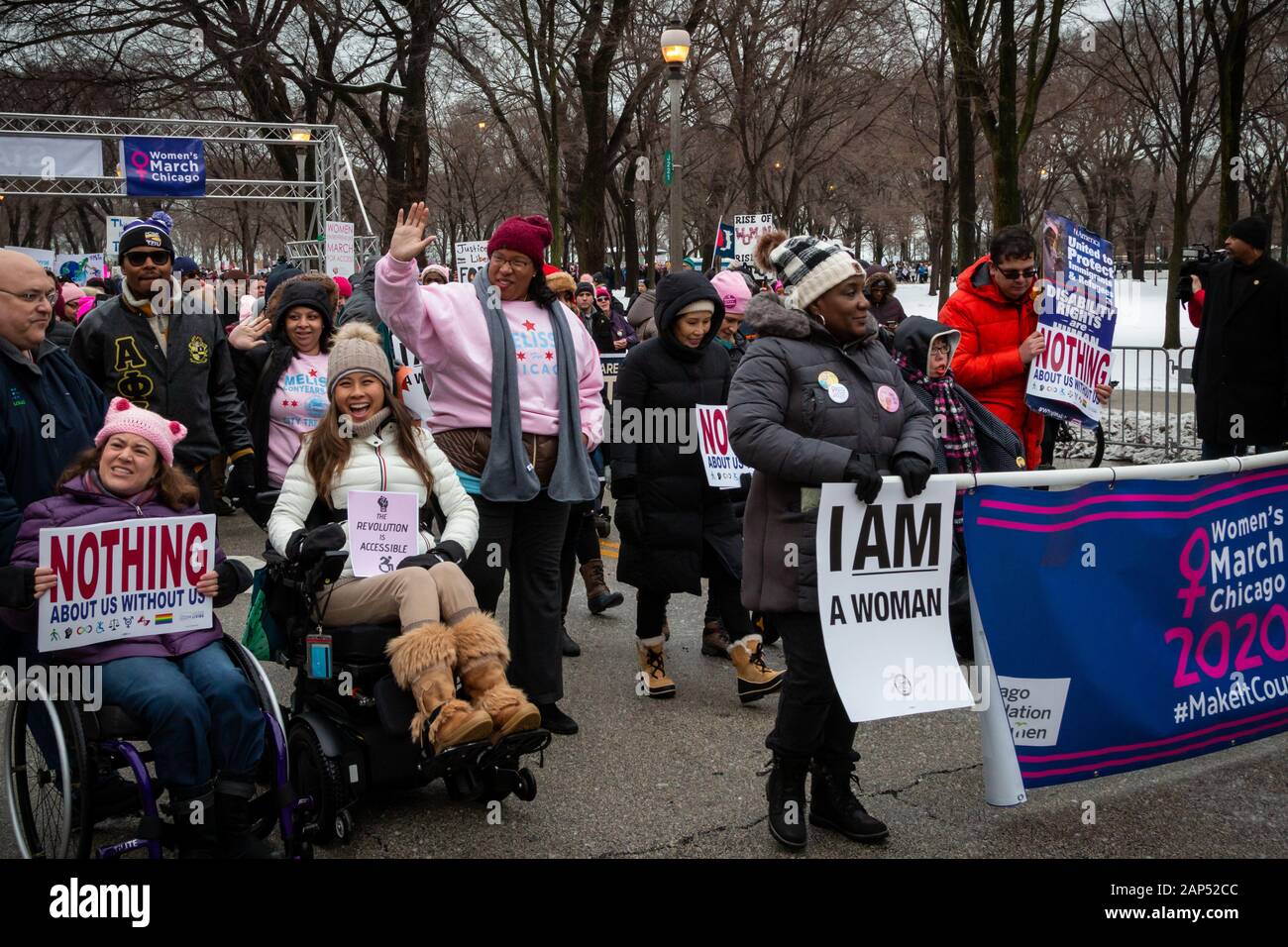 Protestors at the Chicago Women's March 2020, held on January 18. The march started at Columbus Drive and Jackson Boulevard and continued through the Loop to Federal Plaza, after which a large portion of the protestors continued to march towards Trump Tower at Wabash Avenue and the Chicago River. Stock Photo