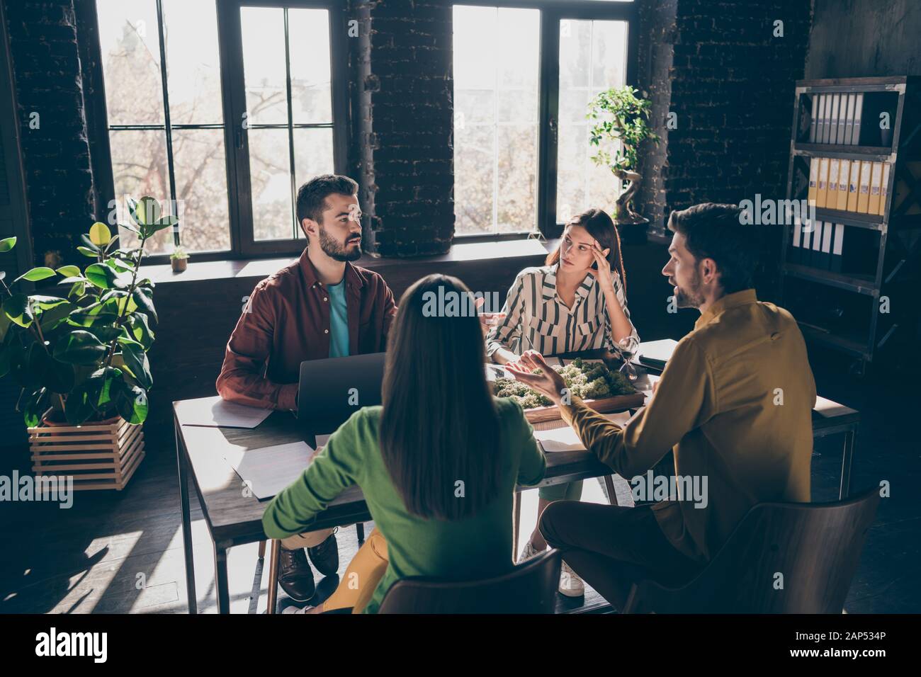 Skilled professional experienced businesspeople specialists sharks experts financier wearing casual formal-wear discussing IT contract at modern Stock Photo