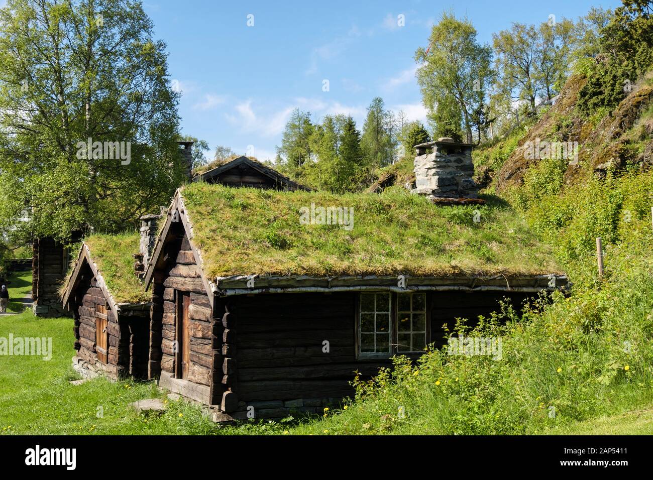 Traditional turf roof log cabins in Sverresborg Trøndelag Folk Museum. Trondheim, Sør-Trøndelag, Norway, Scandinavia Stock Photo
