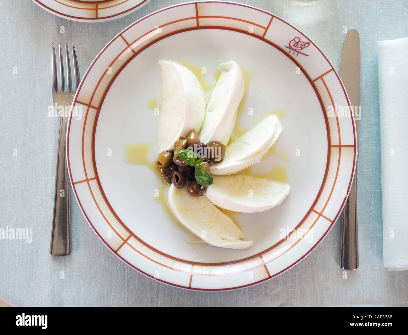 Harry's Bar restaurant, olive taggiasche, mozzarella and extra virgin