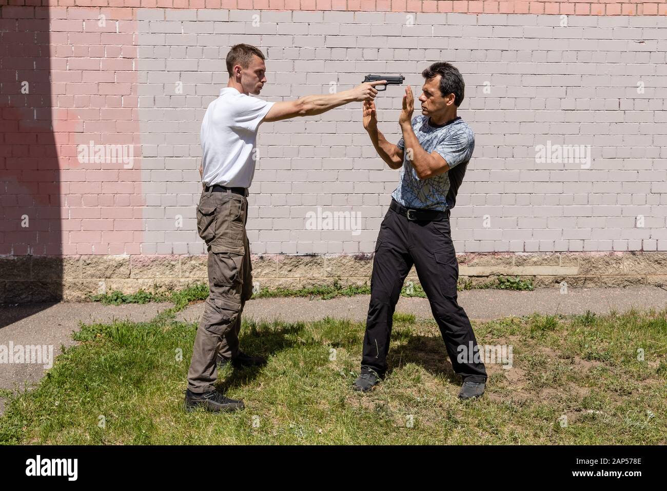 Young Man Threatens Arms To Mature Man Self Defense Techniques Krav Maga Stock Photo Alamy Young Man Threatens Arms To Mature Man Self Defense Techniques Krav Maga Stock Photo Alamy
