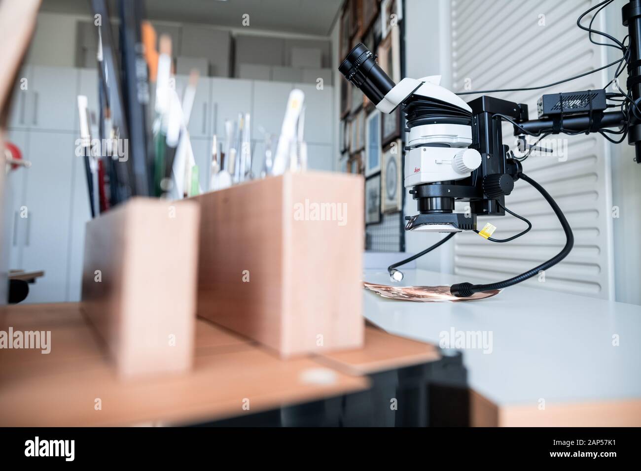 Duesseldorf, Germany. 21st Jan, 2020. A microscope for examining photographs is available in the laboratory. The Düsseldorf City Restoration Centre works on behalf of museums, archives and exhibition houses and was founded in 1976 as a municipal cultural institute. Credit: Fabian Strauch/dpa/Alamy Live News Stock Photo