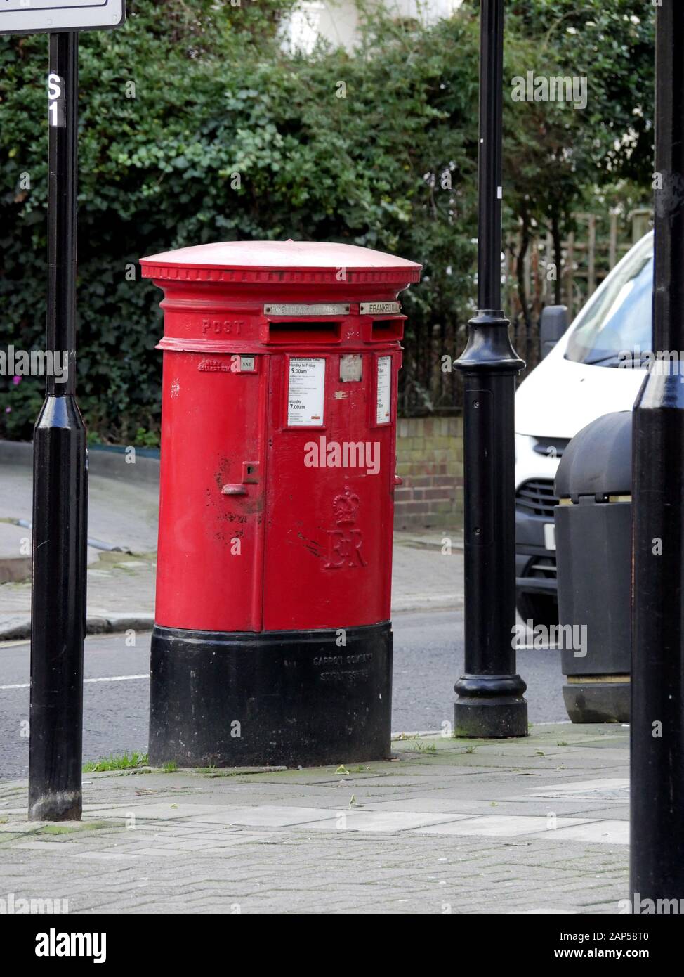 Royal mail double red letter box Stock Photo