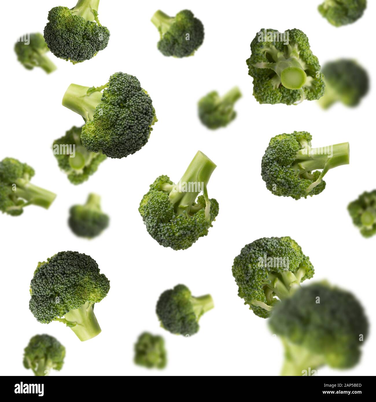 Flying broccoli isolated on white background, pattern Stock Photo