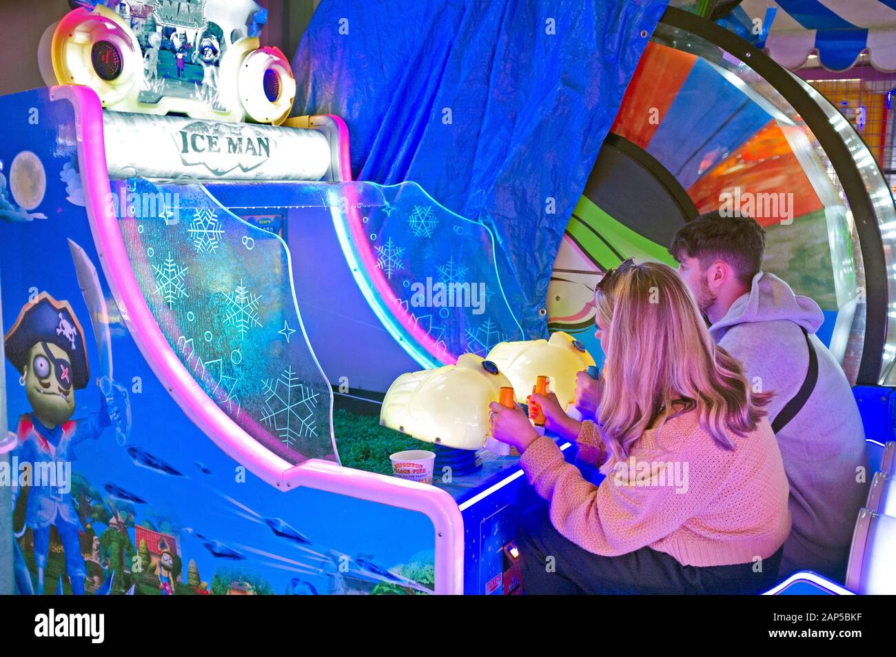 Fun in a games arcade in Brighton Stock Photo Alamy