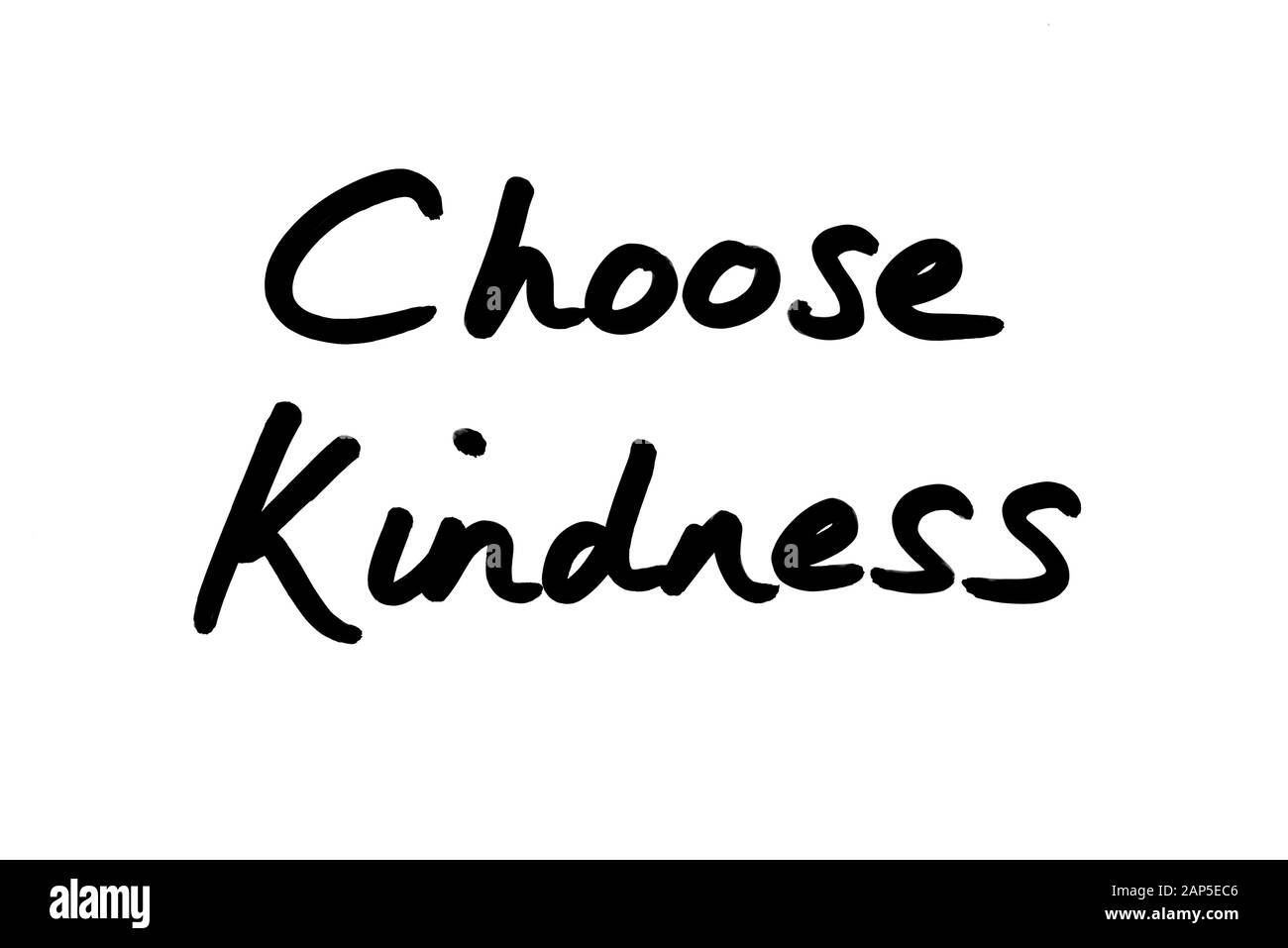 Choose Kindness handwritten over a white background. Stock Photo