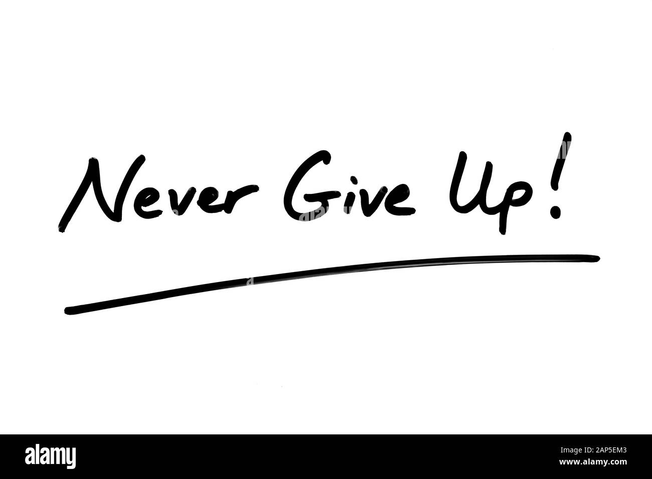 Never Give Up! handwritten on a white background Stock Photo - Alamy