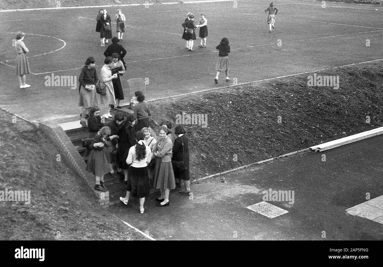 1960s Historical At A Secondary School A Group Of Schoolgirls Gather Together Outside On The Steps Of A Newly Built Raised Tarmac Playground Area England Uk Stock Photo Alamy 1960s Historical At A Secondary School A Group Of Schoolgirls Gather Together Outside On The Steps Of A Newly Built Raised Tarmac Playground Area England Uk Stock Photo Alamy