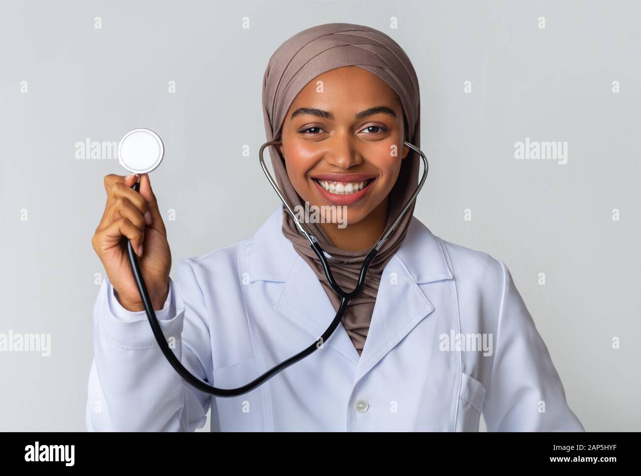 Portraif of black muslim female doctor in hijab with stethoscope Stock Photo