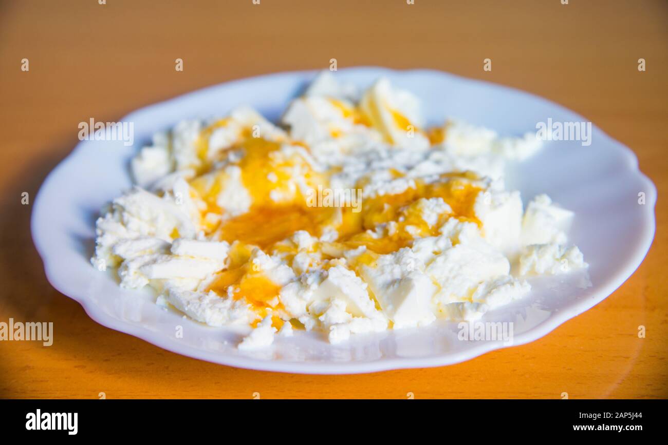 Cottage cheese with honey. Stock Photo