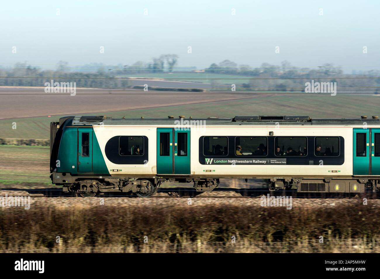 London NorthWestern Railway class 350 electric train on the West Coast Main Line, Warwickshire, UK Stock Photo