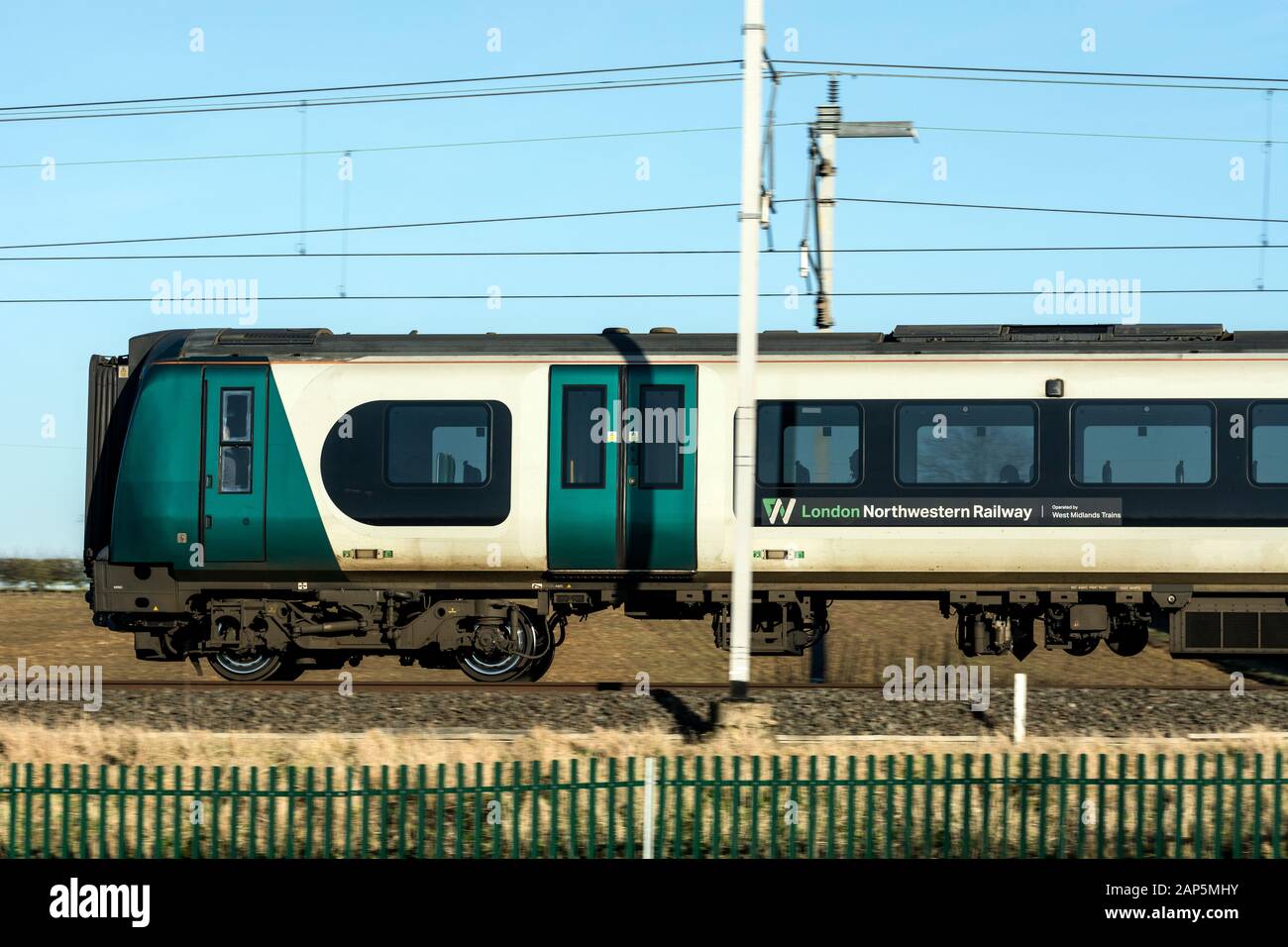 London NorthWestern Railway class 350 electric train on the West Coast Main Line, Northamptonshire, UK Stock Photo