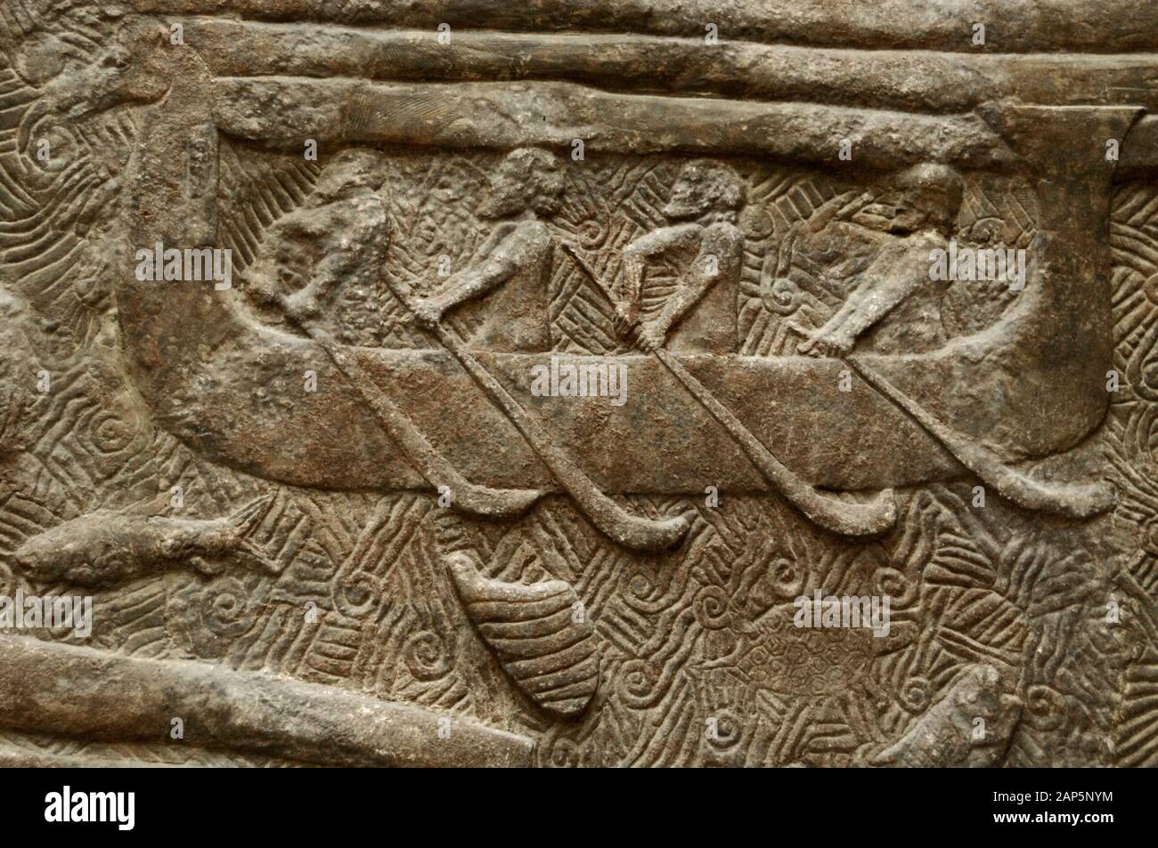 Frieze of the transportation of timber (cedars of Lebanon). Detail of one of the reliefs from the Palace of King Sargon II in Dur Sharrukin (Khorsabad, Iraq), 8th century. Northern facade. Museum of Louvre. Paris, France. Stock Photo