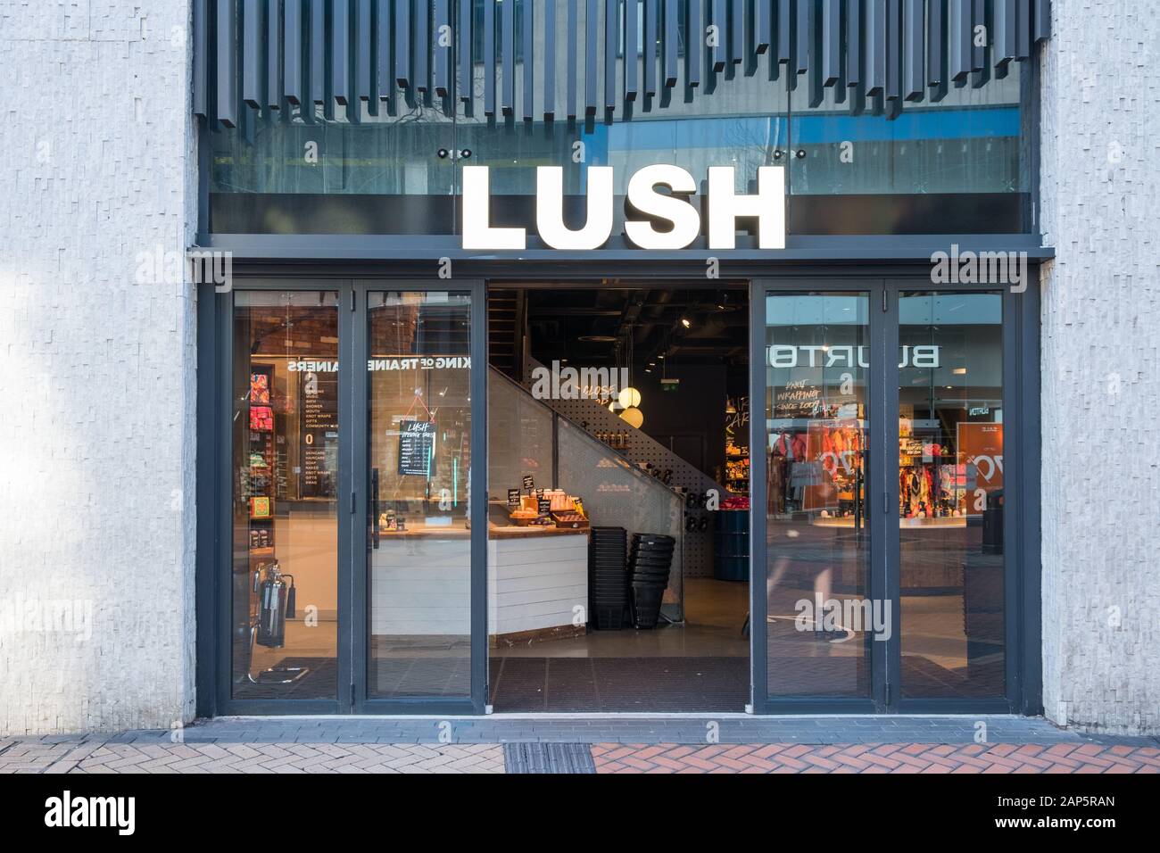 View of the shopfront of the fresh handmade cosmetics and beauty store LUSH  in Broadmead in Bristol with two women shoppers walking out of the door  Stock Photo - Alamy