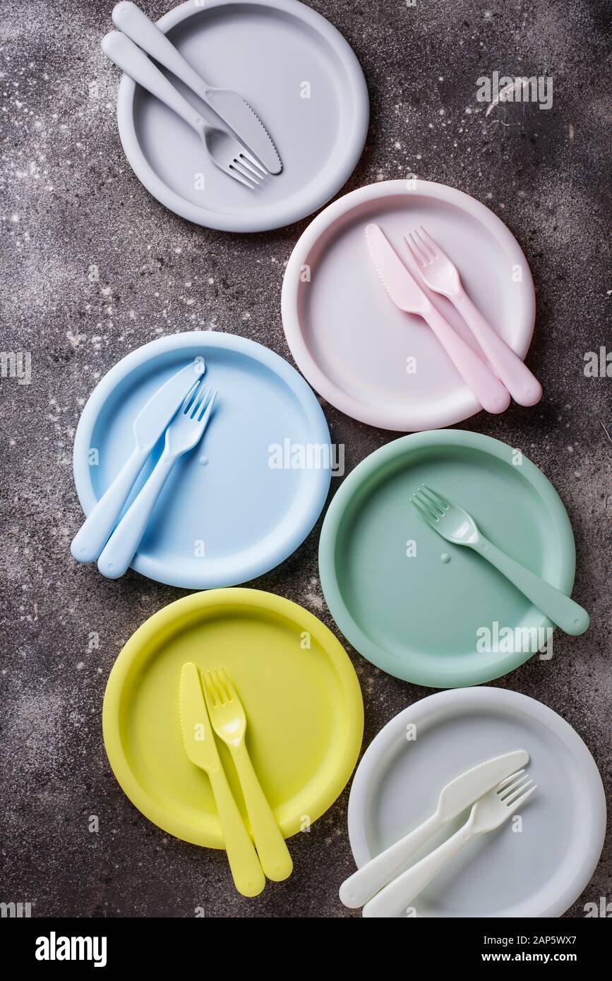 Colorful plastic dishes for summer picnic Stock Photo Alamy