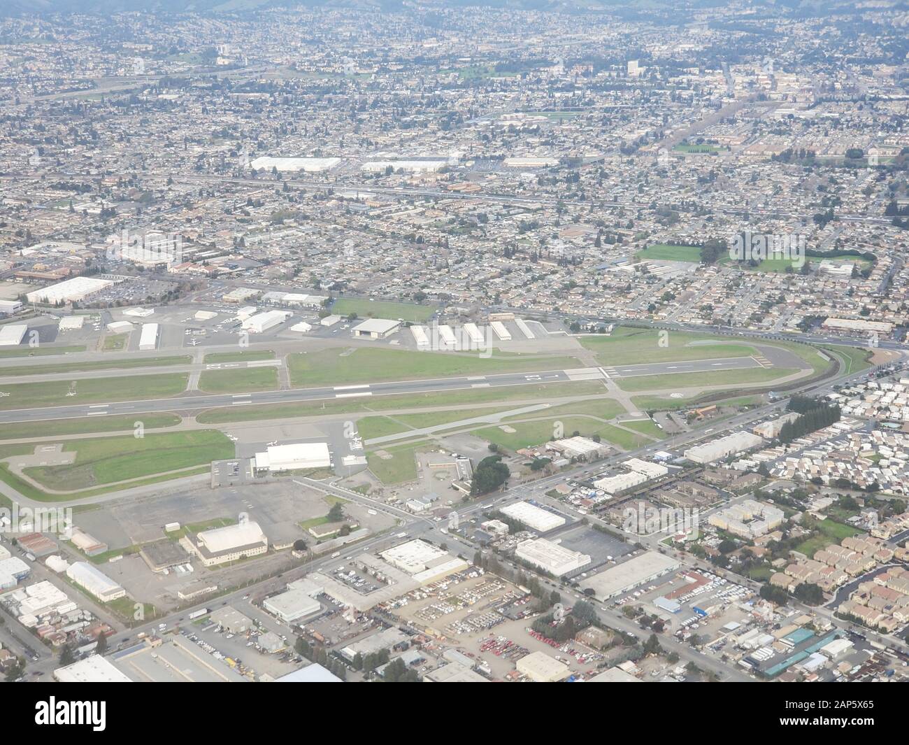 Hayward Execute Airport (HWD) is visible in an aerial view of the East Bay region of the San Francisco Bay area, Hayward, California, January 8, 2020. () Stock Photo