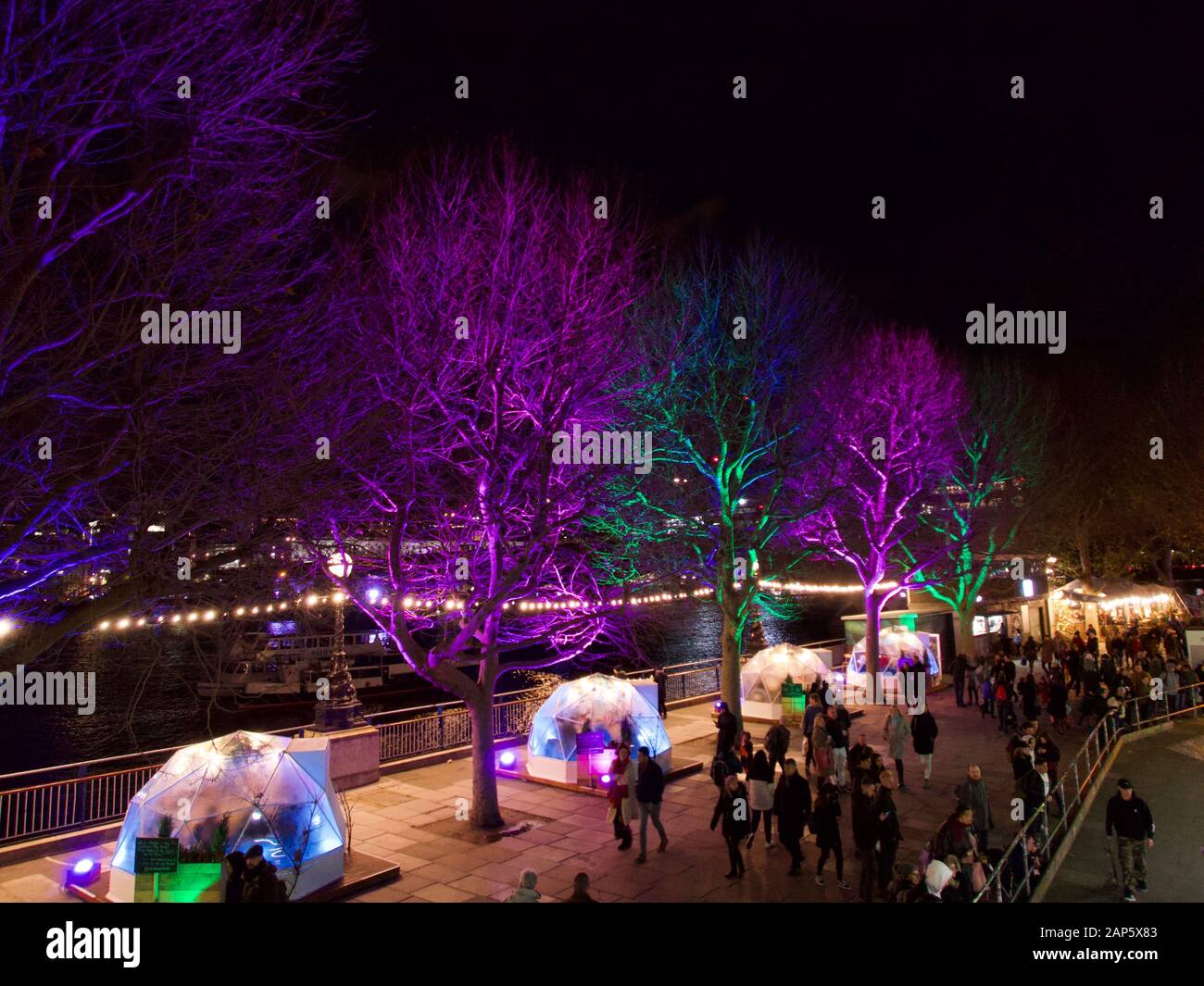 9 December 2019 - London, UK: Southbank trees illuminated by night Stock Photo