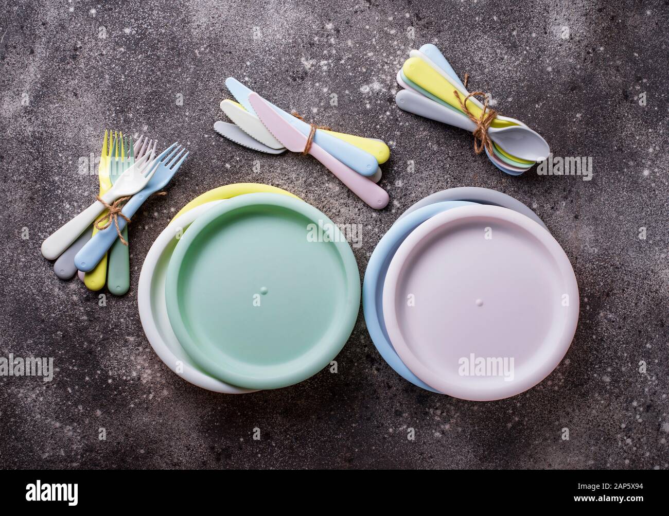 Colorful plastic dishes for summer picnic Stock Photo Alamy