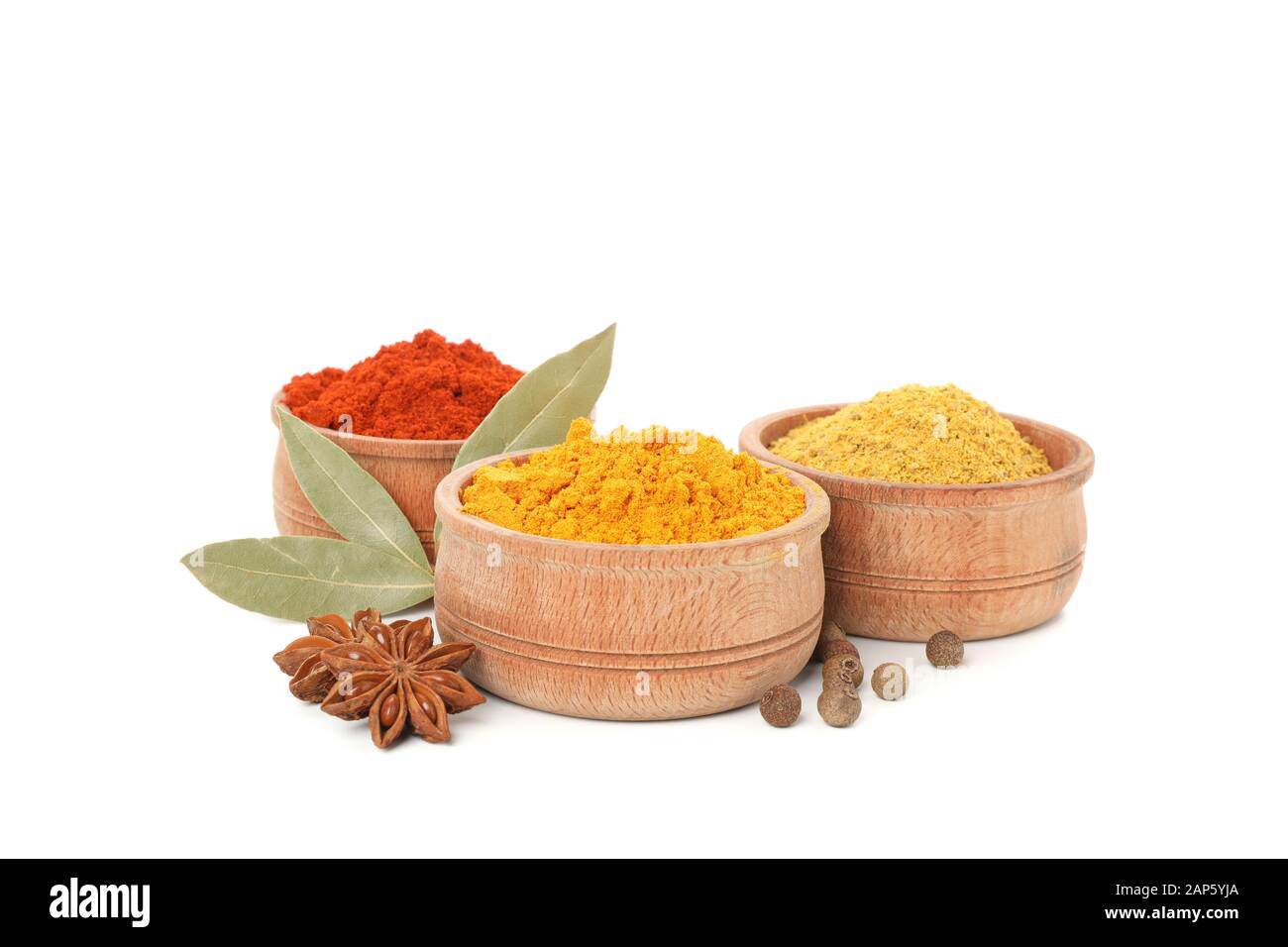 Wooden bowls with powders and ingredients isolated on white background Stock Photo Alamy