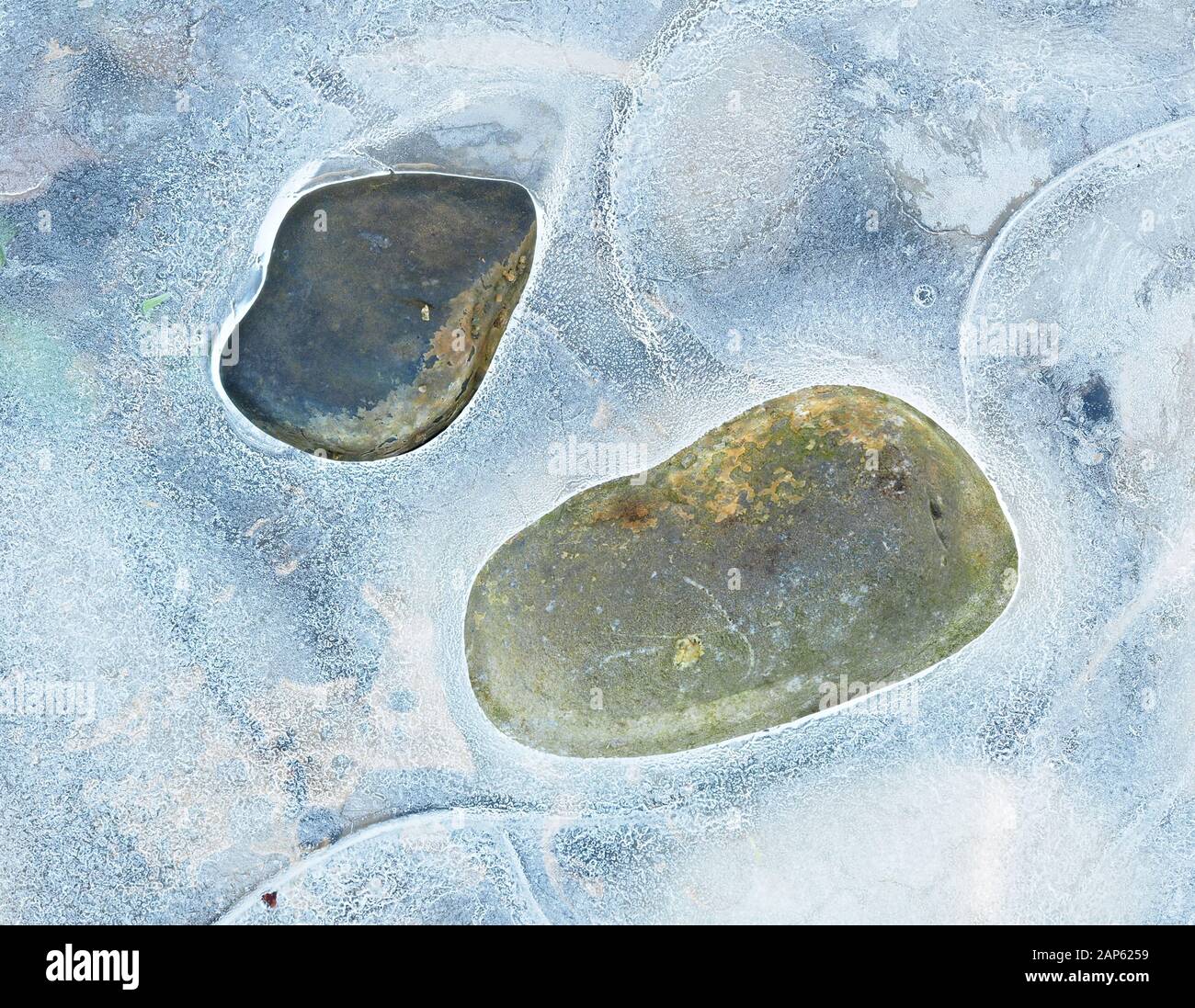 Abstract image of two stones surrounded by ice Stock Photo