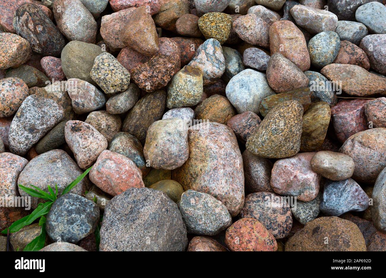 Granite stones, rocks set  us background. Big granite stones boulders of various forms. Stone for the background. Stock Photo