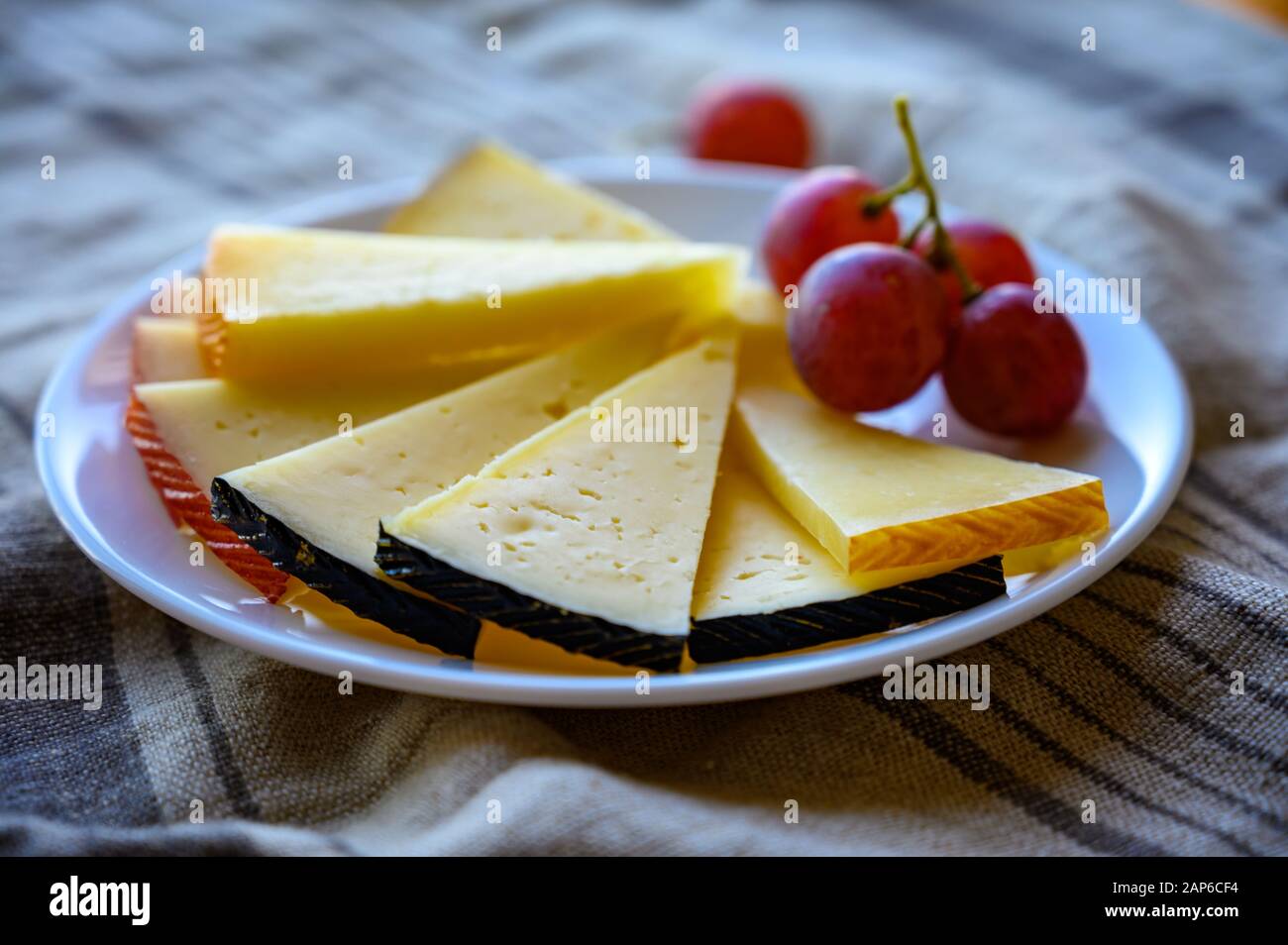 Cheese collection, variety of Spanish manchego cheese made from cow and goat milk close up Stock