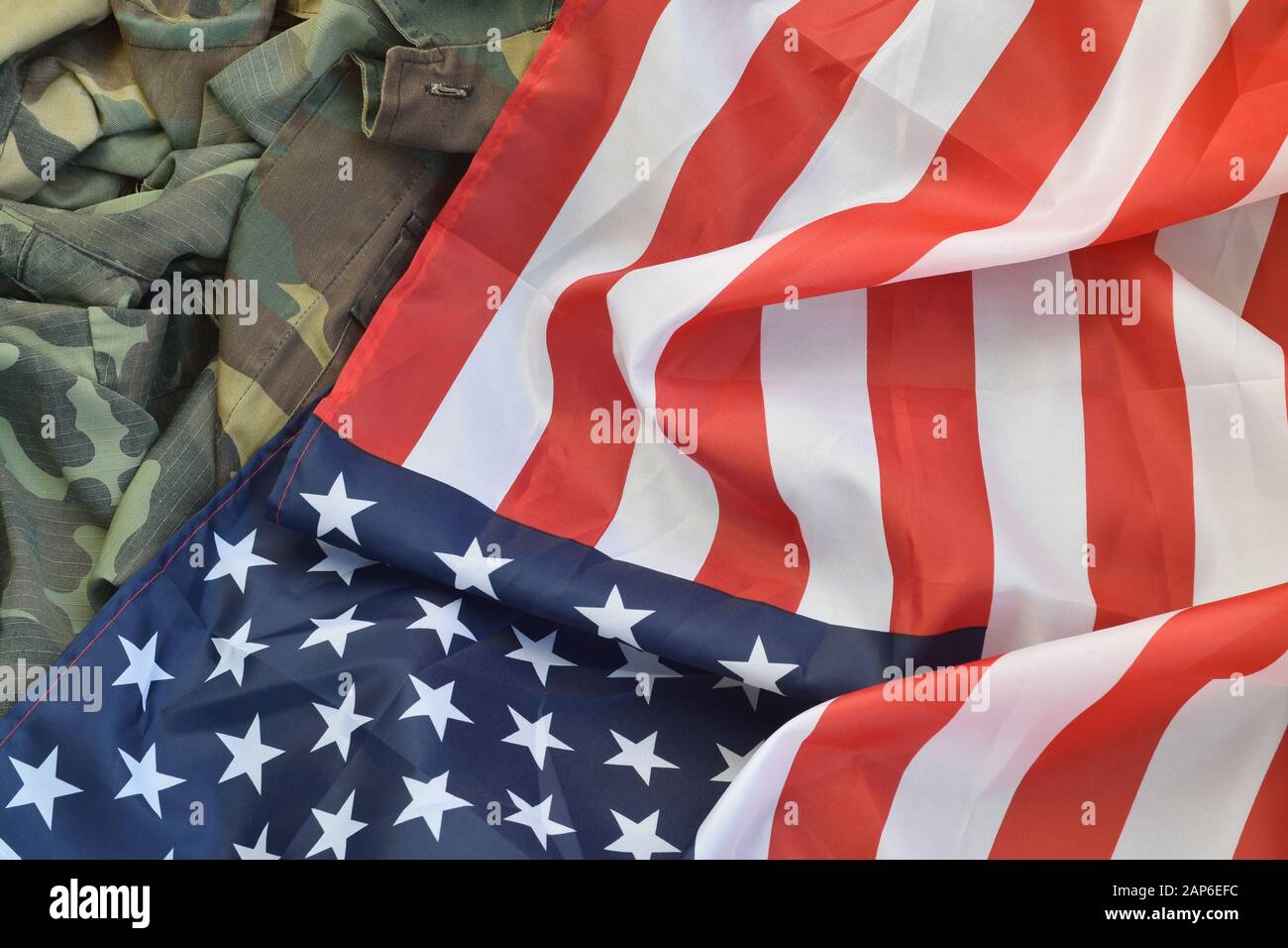 United States of America flag and folded military uniform jacket. Military  symbols conceptual background banner for american patriotic holidays design  Stock Photo - Alamy