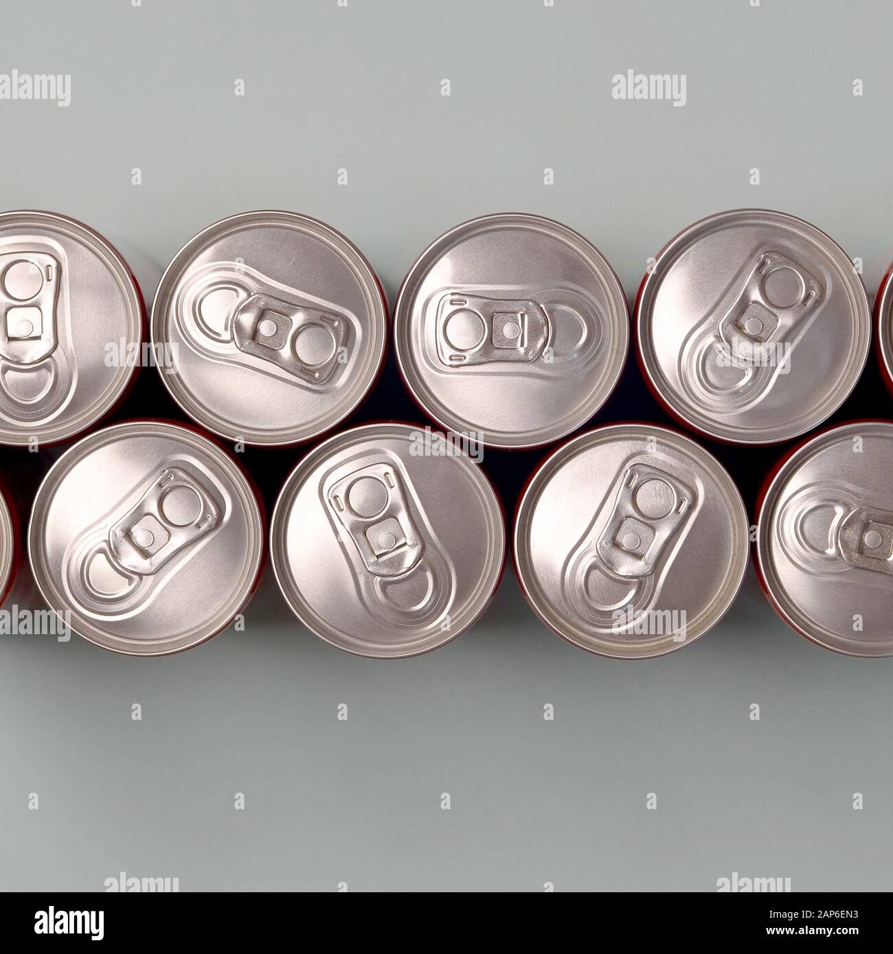 Many new aluminium cans of soda soft drink, lemonade cola, beer or ...