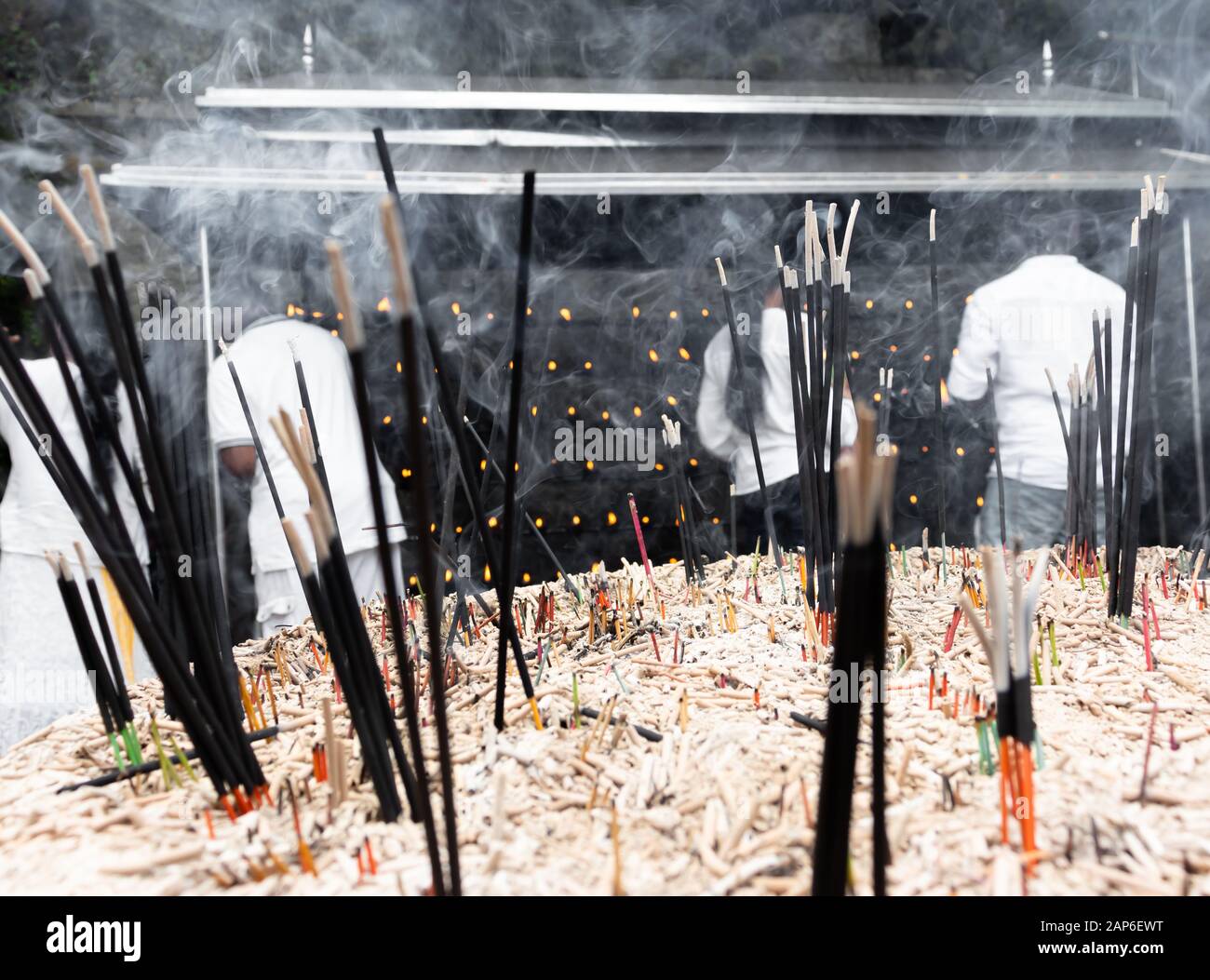 Burning incense sticks is a sacred offering in Buddhism Stock Photo Alamy