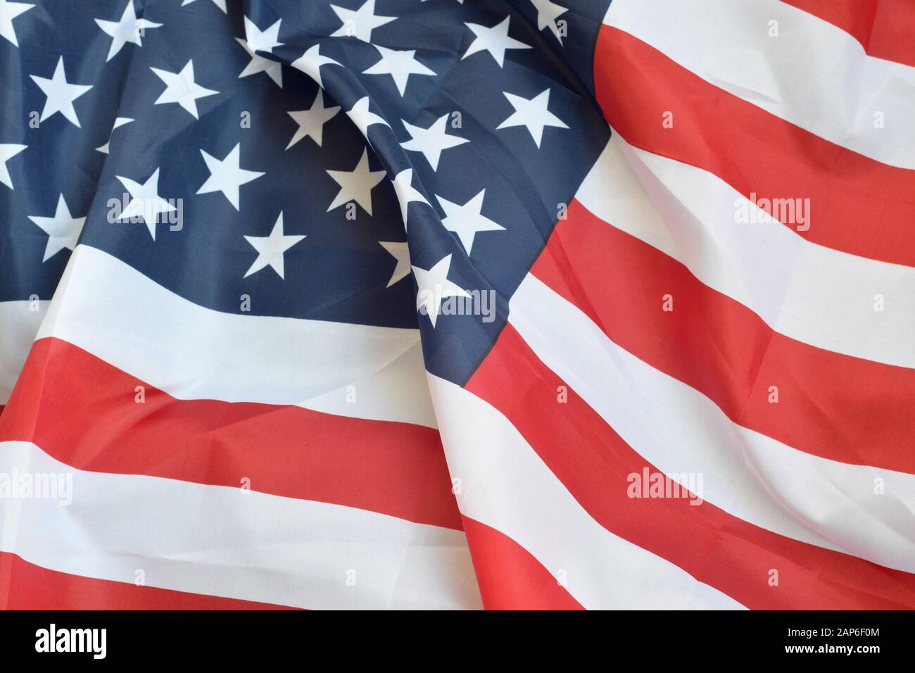 Closeup of American flag on plain background. Colorful waving horizontal US  banner with stars and stripes Stock Photo - Alamy