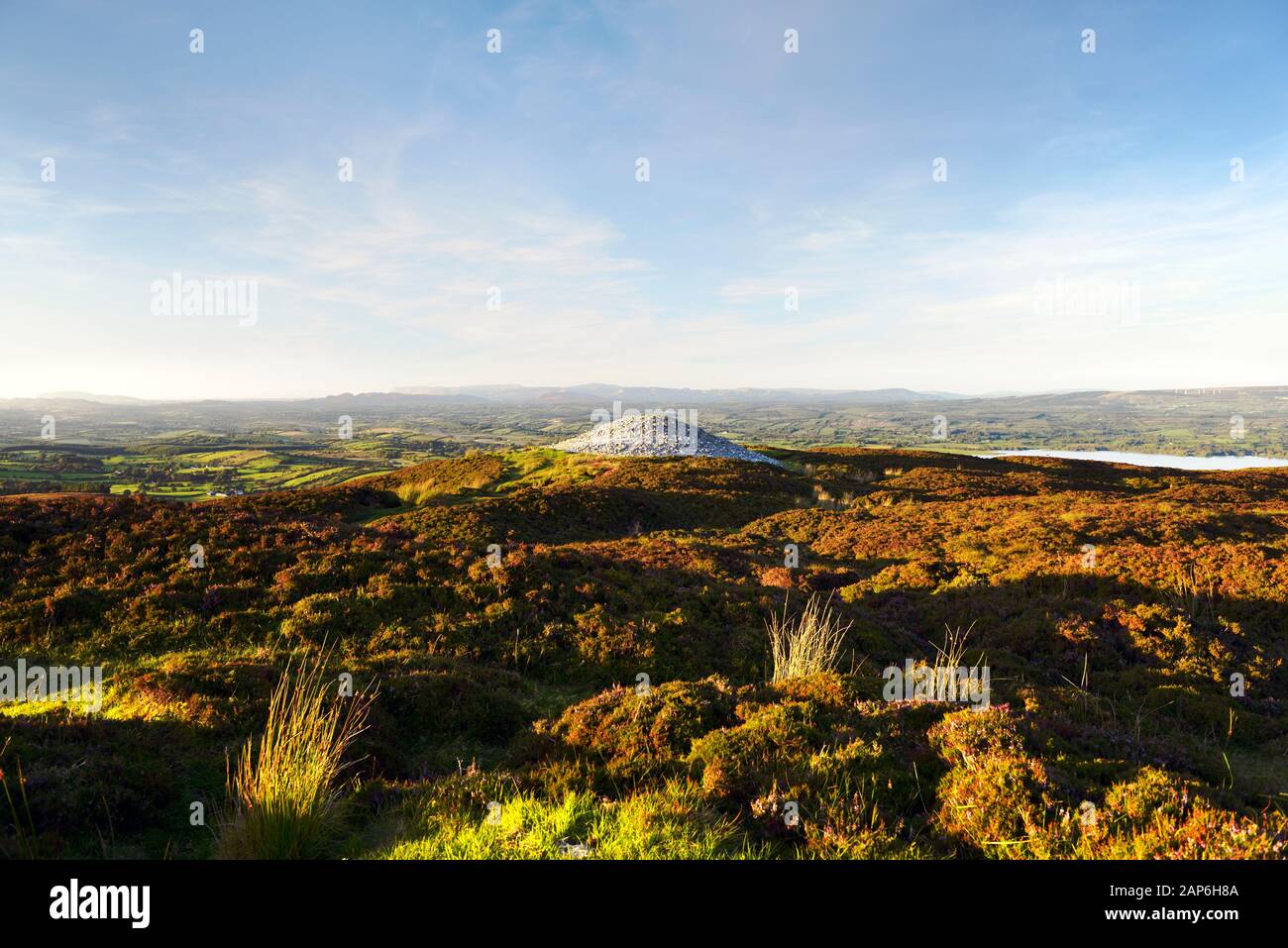 Carrowkeel Neolithic passage tomb necropolis. Bricklieve Hills Co. Sligo, Ireland. Cairn G seen from Cairn H with Lough Arrow below to the N.E. Stock Photo