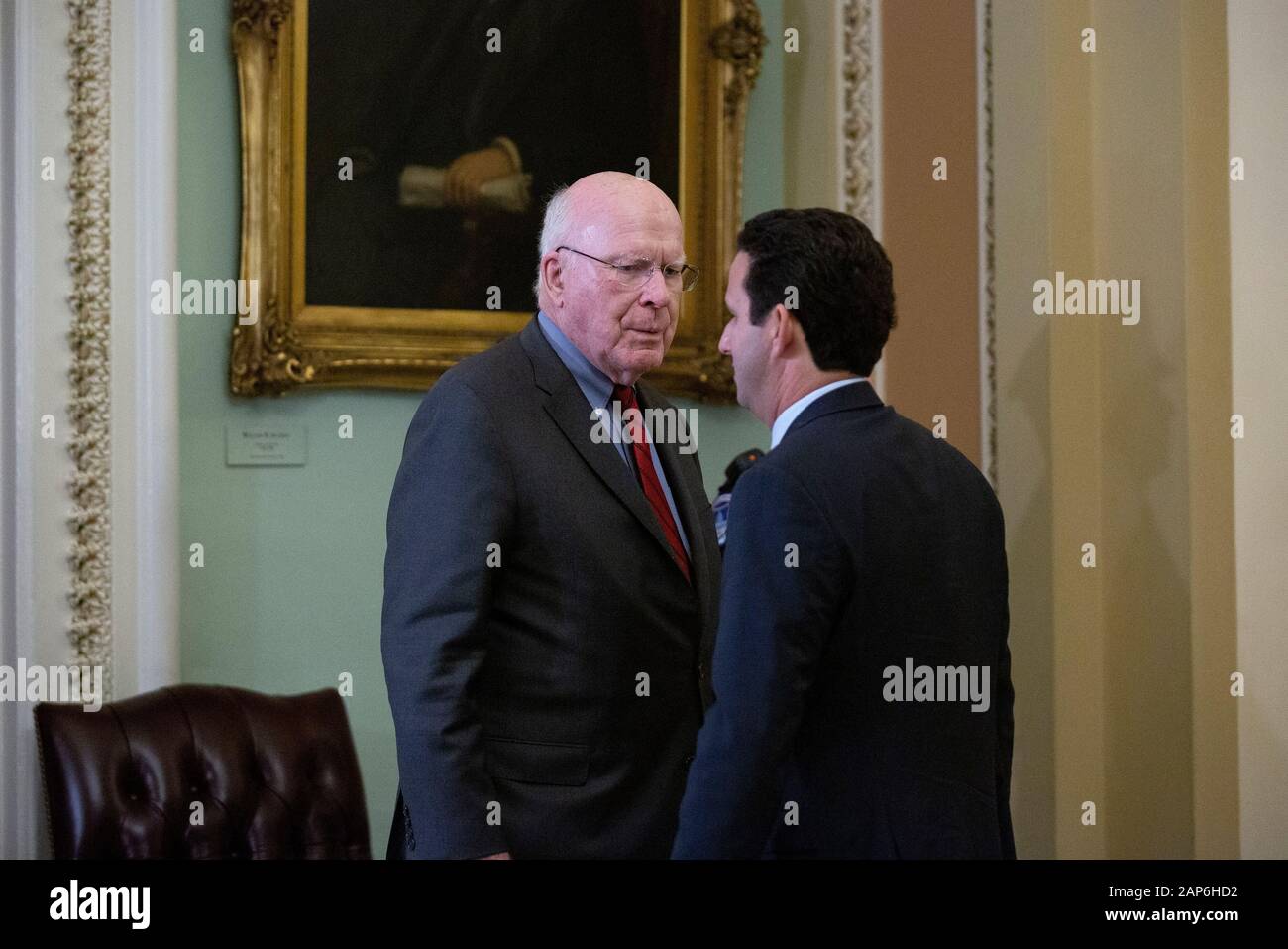 United States Senator Patrick Leahy (Democrat of Vermont) speaks to United States Senator Brian Schatz (Democrat of Hawaii) as they make their way to the Senate Floor at the United States Capitol in Washington, DC, U.S., on Tuesday, January 21, 2020, as the United States Senate formally starts the impeachment trial against United States President Donald J. Trump. Credit: Stefani Reynolds/CNP /MediaPunch Stock Photo
