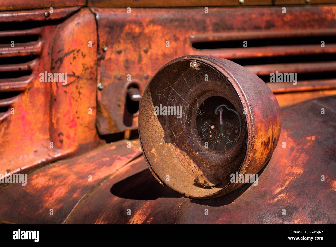 Close-up of a rusty headlight on an old pick-up truck Stock Photo