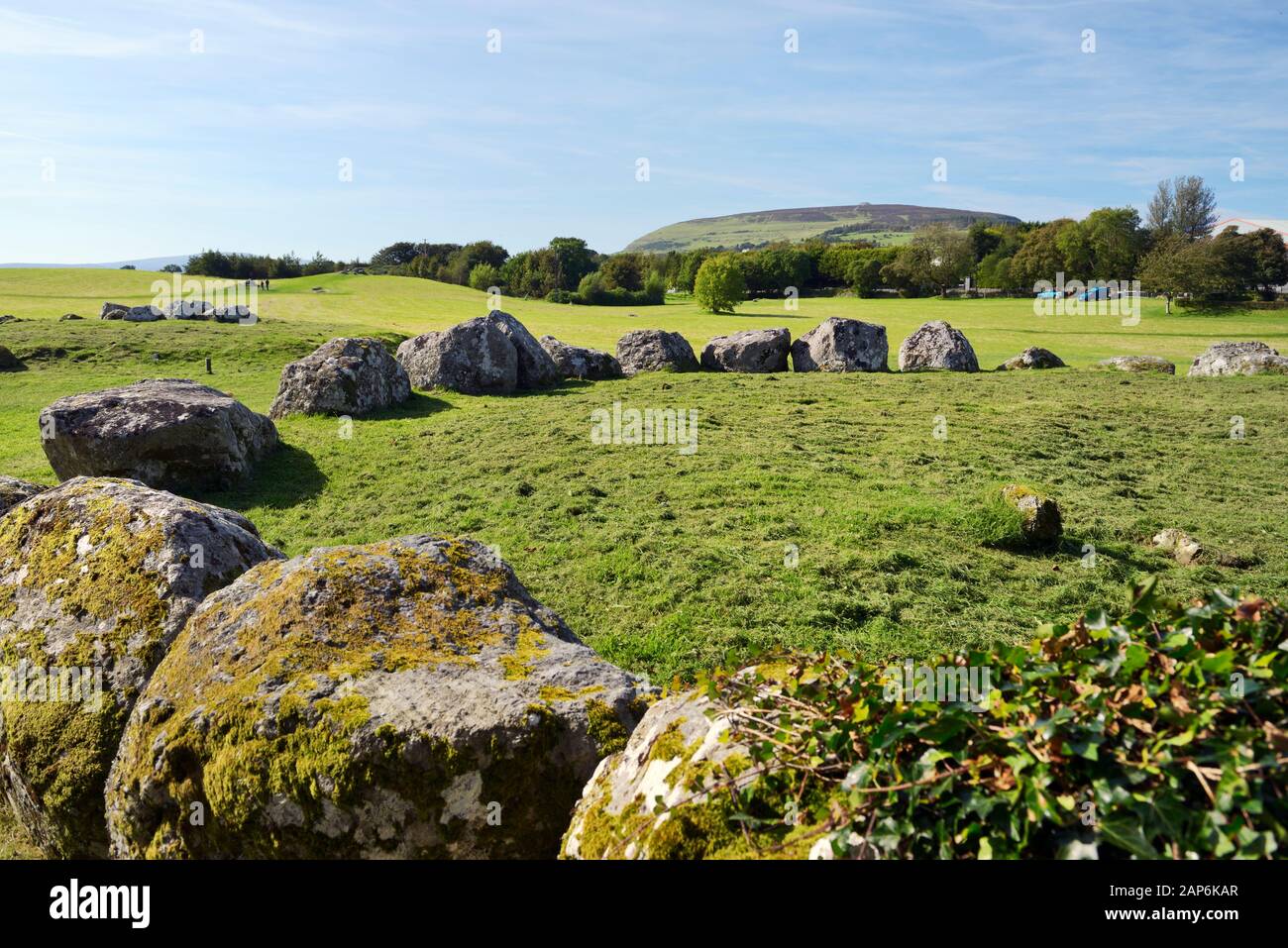 Carrowmore Neolithic megalithic burial complex 5000+ years old. West over stone circle Carrowmore 57 to Queen Maeves Grave cairn on top of Knocknarea Stock Photo