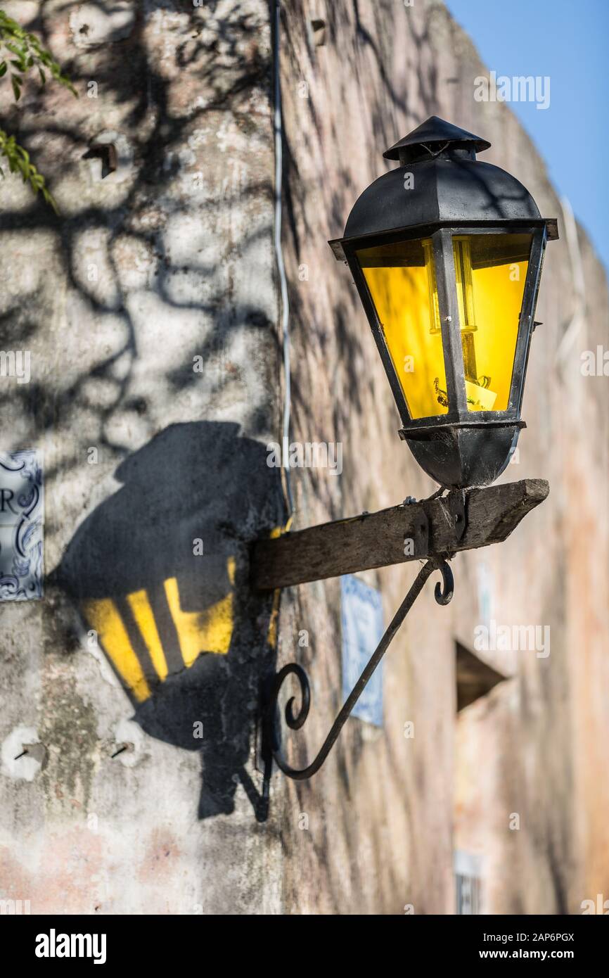 Old style metal lantern on wall Stock Photo