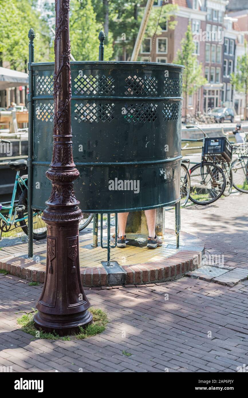 Typical Amsterdam public toilet facility for men Stock Photo - Alamy