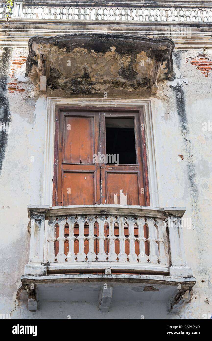 Spanish style decayed veranda with balcony Stock Photo Alamy