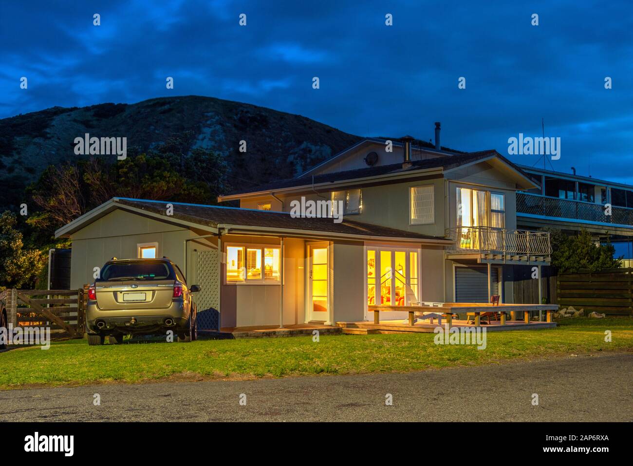 A typical New Zealand 'Bach' or beachside home, here at Mahia. Stock Photo