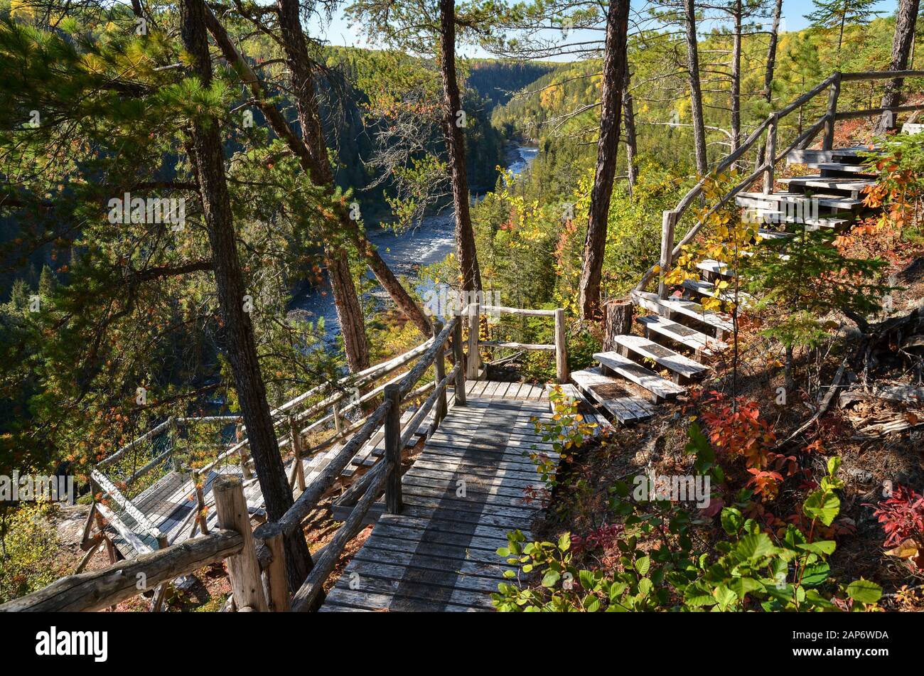 Hiking trail (wooden stairs) along the Rimouski river in The Canyon des