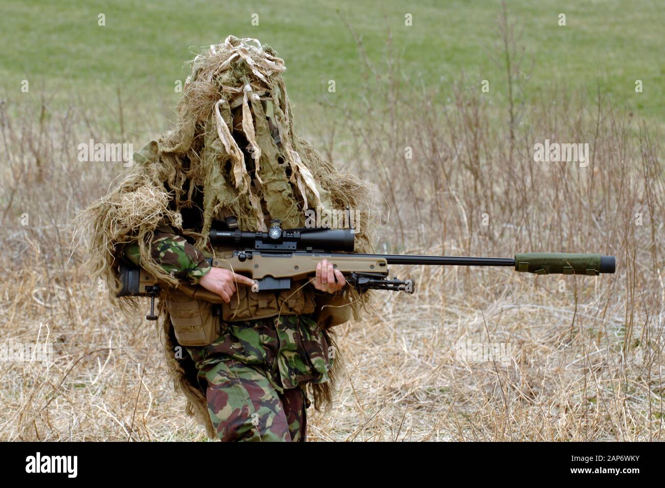 British Infantryman with a long range sniper rifle L115A3 which has a killing capability from over a mile. Stock Photo