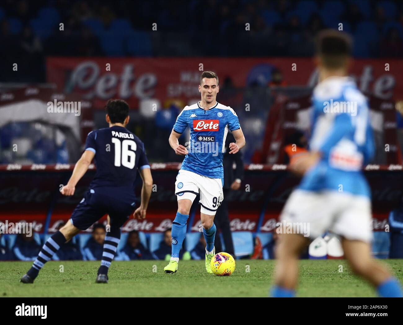 21st January 2020; Stadio San Paolo, Naples, Campania, Italy; Coppa Italia Football, Napoli versus Lazio; Arkadiusz Milik of Napoli comes forward on the ball covered by Parolo of Lazio- Editorial Use Stock Photo