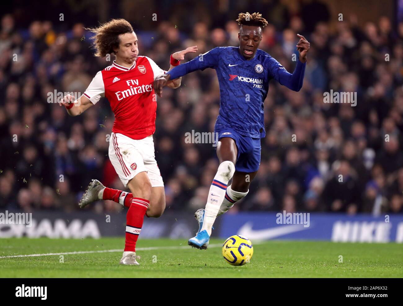 Arsenal's David Luiz fouls Chelsea's Tammy Abraham before being shown a red  card during the Premier League match at Stamford Bridge, London Stock Photo  - Alamy