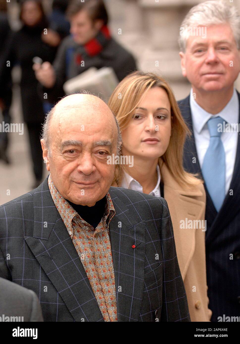 Mohamed Al Fayed with spokespersons Katherine Witty and Michael Cole leaving the High Court in London while the jury consider their verdict in the inquest into the deaths of Princess Diana and Dodi Fayed in 2008. Stock Photo