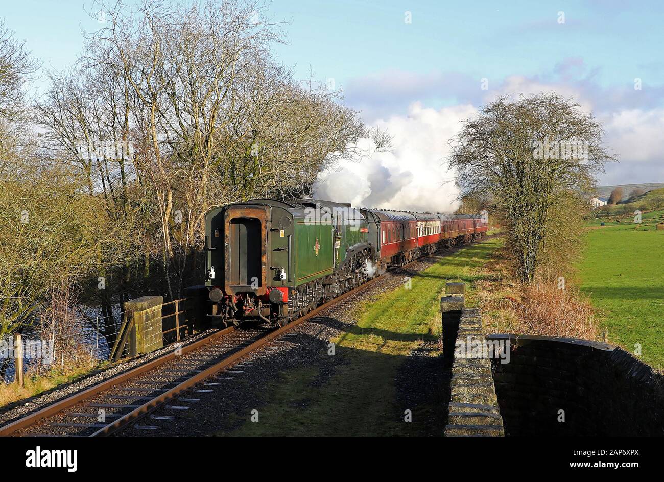 60009 Union of South Africa heads away from Irwell Vale tender first on the East Lancs Railway. Stock Photo