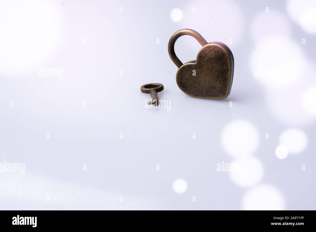 Metal padlock in heart shape as symbol of love Stock Photo - Alamy