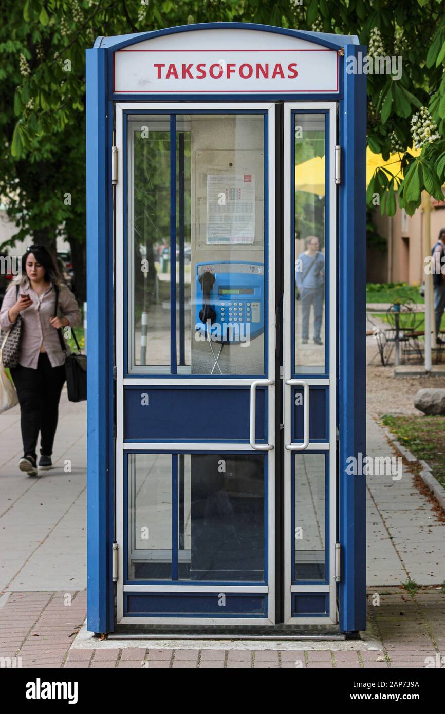 Lithuanian Taksofonas telephone booth or telephone box in Vilnius, Lithuania Stock Photo