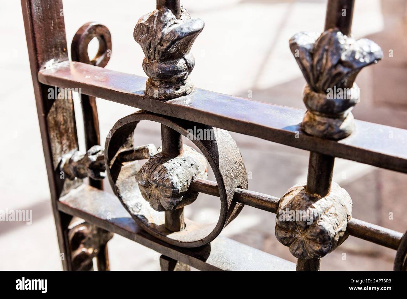 Metal fence with ornamental design Stock Photo