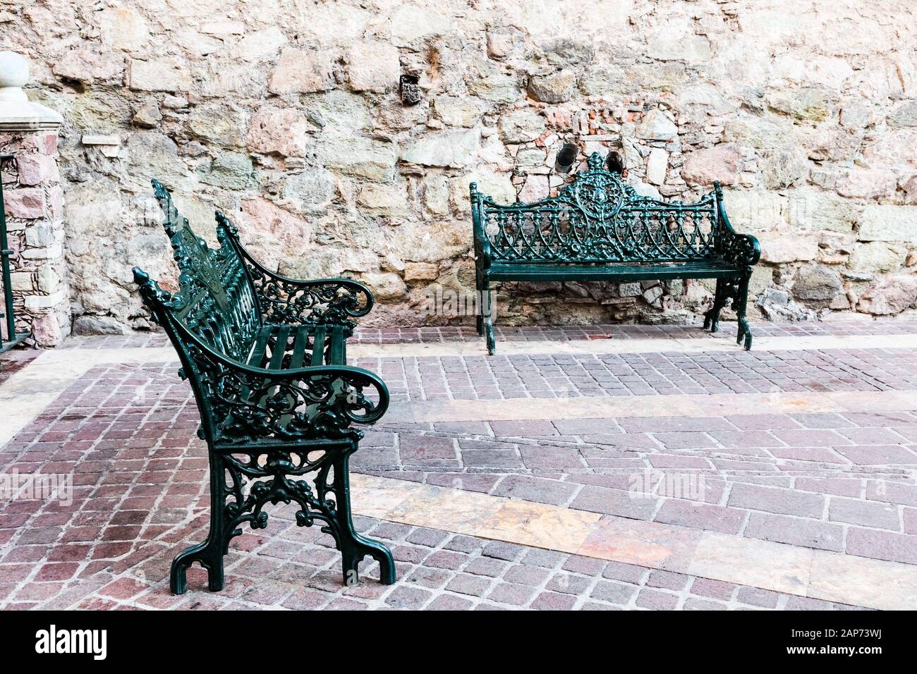 Metal Church Bench with ornamental style Stock Photo