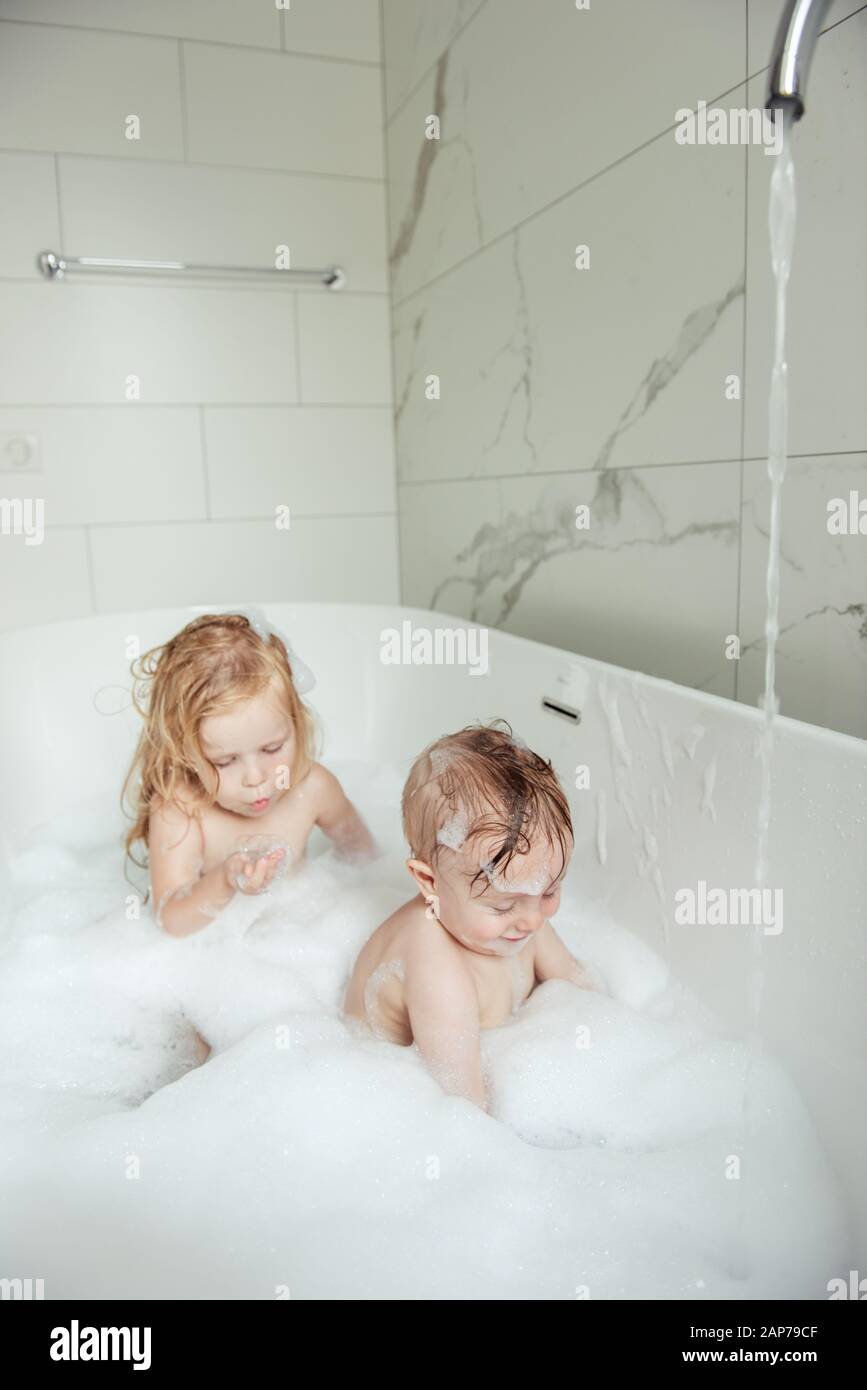 little brother and sister bathing in a foam bath Stock Photo Alamy little brother and sister bathing in a foam bath Stock Photo Alamy